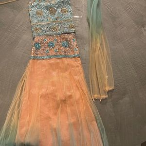 Halter kids lehenga embellished with sequins work